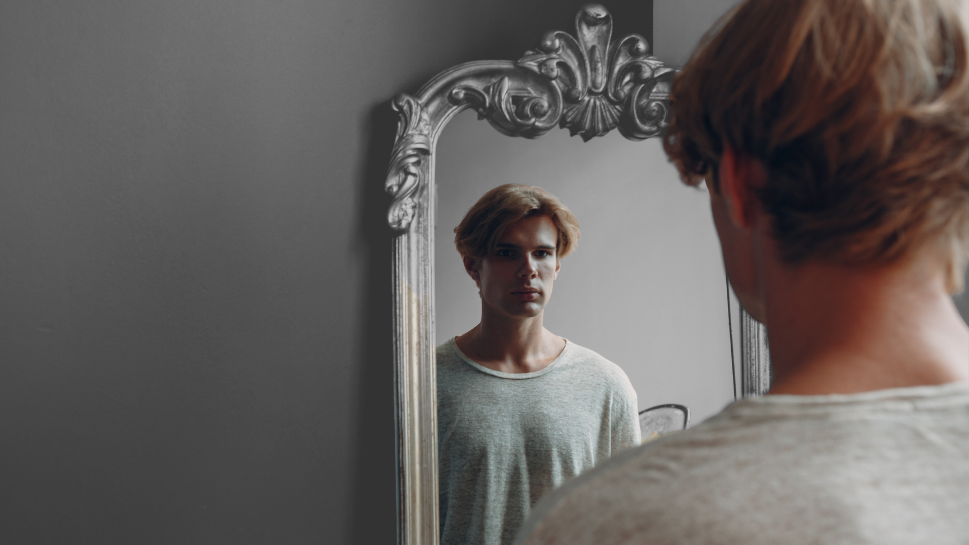 Person in mirror